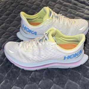 Hoka Women's White Running Sneakers with Blue Logo and Pastel Accents